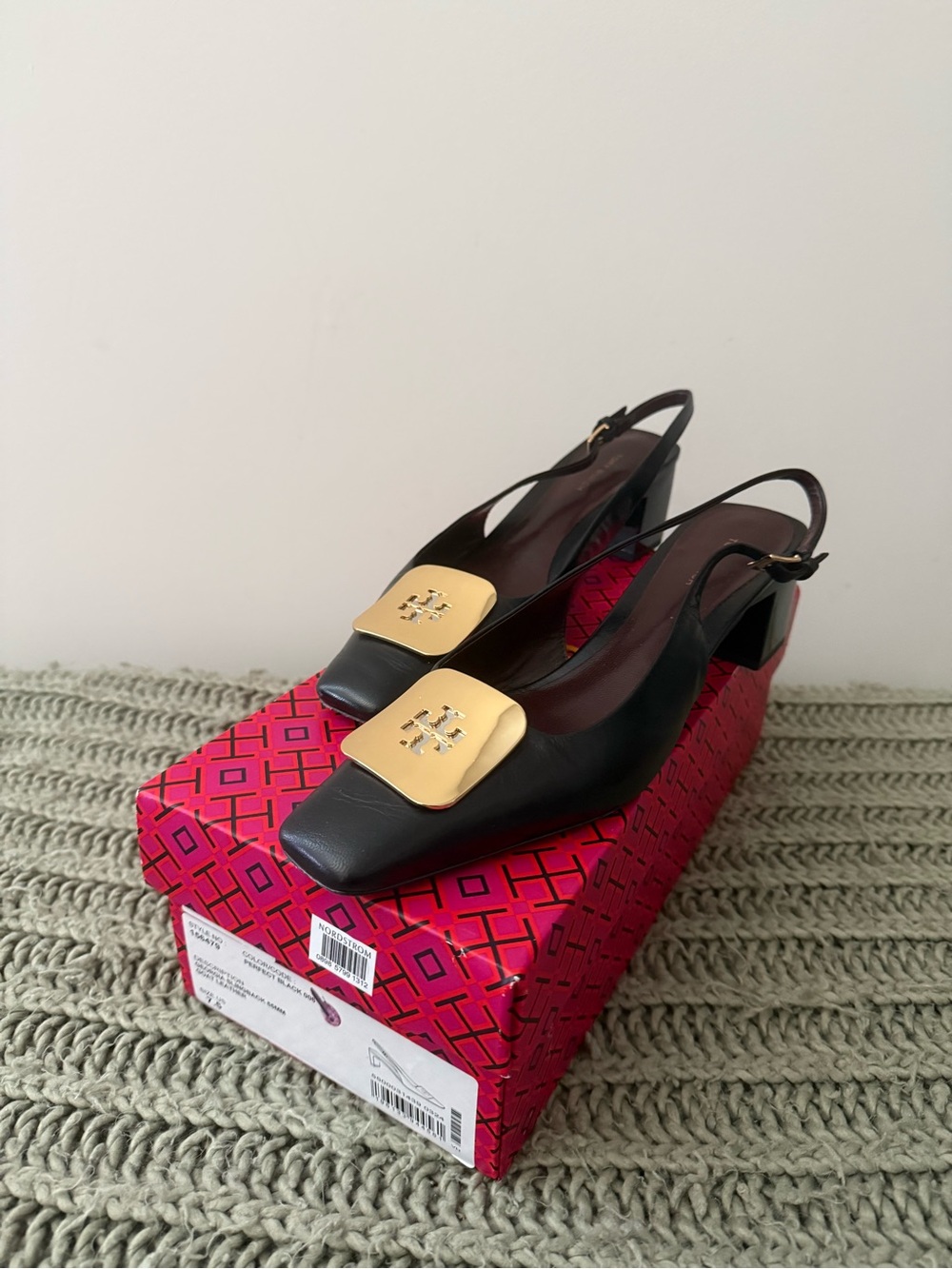 Like New!! Tory Burch Black Leather Slingback Pumps with Gold Logo Plaque.